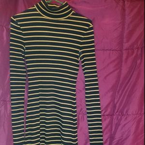 Black and gold striped turtleneck dress